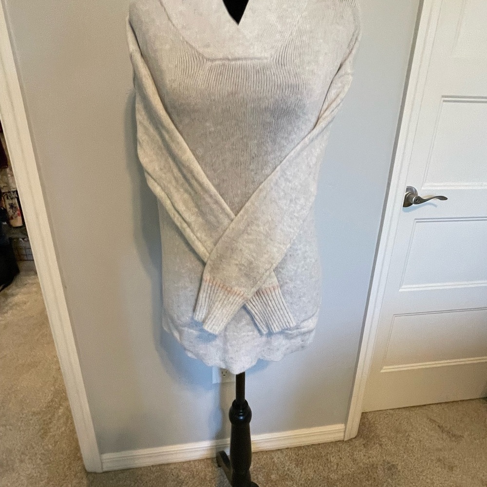 Nice sweater with the hood. Has some color accents on the trim and hood part